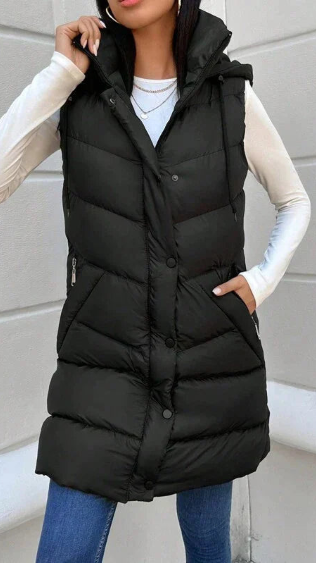 Chaqueta acolchada larga sin mangas